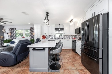 Experience the ultimate Florida lifestyle in this stunning home on Rotonda Golf and Country Club The Palms Course in Florida - for sale on GolfHomes.com, golf home, golf lot