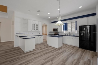 Discover the perfect blend of comfort, elegance, and on Southern Woods Golf Club in Florida - for sale on GolfHomes.com, golf home, golf lot