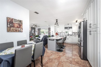 Experience the ultimate Florida lifestyle in this stunning home on Rotonda Golf and Country Club The Palms Course in Florida - for sale on GolfHomes.com, golf home, golf lot