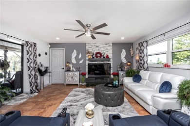 Experience the ultimate Florida lifestyle in this stunning home on Rotonda Golf and Country Club The Palms Course in Florida - for sale on GolfHomes.com, golf home, golf lot