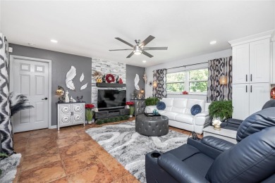 Experience the ultimate Florida lifestyle in this stunning home on Rotonda Golf and Country Club The Palms Course in Florida - for sale on GolfHomes.com, golf home, golf lot