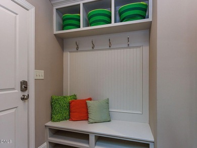 Main Floor Primary & In-Law Suite: Nestled beautifully among the on Heritage Golf Club in North Carolina - for sale on GolfHomes.com, golf home, golf lot