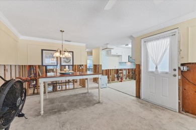 Under contract-accepting backup offers. LOWEST PRICED SFR on Key Royale Club in Florida - for sale on GolfHomes.com, golf home, golf lot