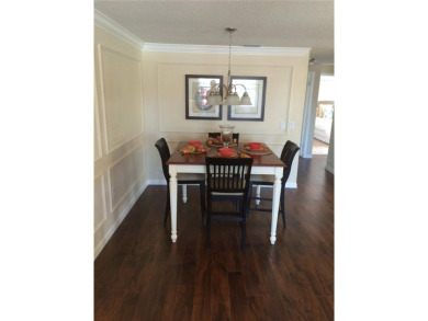 Under contract-accepting backup offers. LOWEST PRICED SFR on Key Royale Club in Florida - for sale on GolfHomes.com, golf home, golf lot