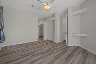 Discover the perfect blend of comfort, elegance, and on Southern Woods Golf Club in Florida - for sale on GolfHomes.com, golf home, golf lot