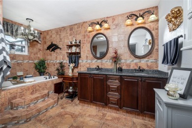 Experience the ultimate Florida lifestyle in this stunning home on Rotonda Golf and Country Club The Palms Course in Florida - for sale on GolfHomes.com, golf home, golf lot