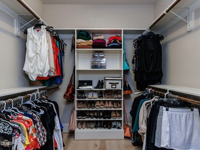 Main Floor Primary & In-Law Suite: Nestled beautifully among the on Heritage Golf Club in North Carolina - for sale on GolfHomes.com, golf home, golf lot