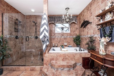 Experience the ultimate Florida lifestyle in this stunning home on Rotonda Golf and Country Club The Palms Course in Florida - for sale on GolfHomes.com, golf home, golf lot
