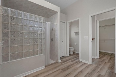 Discover the perfect blend of comfort, elegance, and on Southern Woods Golf Club in Florida - for sale on GolfHomes.com, golf home, golf lot