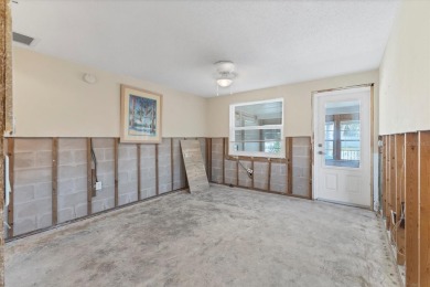 Under contract-accepting backup offers. LOWEST PRICED SFR on Key Royale Club in Florida - for sale on GolfHomes.com, golf home, golf lot