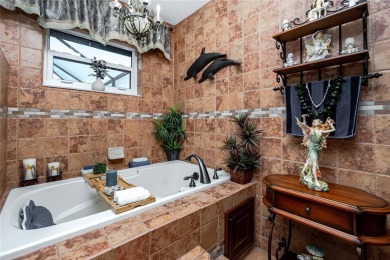 Experience the ultimate Florida lifestyle in this stunning home on Rotonda Golf and Country Club The Palms Course in Florida - for sale on GolfHomes.com, golf home, golf lot