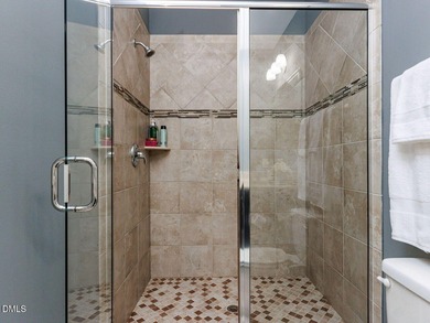 Main Floor Primary & In-Law Suite: Nestled beautifully among the on Heritage Golf Club in North Carolina - for sale on GolfHomes.com, golf home, golf lot