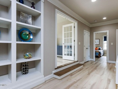 Main Floor Primary & In-Law Suite: Nestled beautifully among the on Heritage Golf Club in North Carolina - for sale on GolfHomes.com, golf home, golf lot