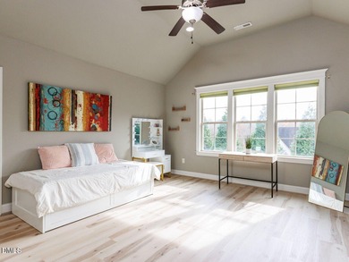 Main Floor Primary & In-Law Suite: Nestled beautifully among the on Heritage Golf Club in North Carolina - for sale on GolfHomes.com, golf home, golf lot