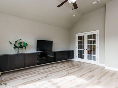 Main Floor Primary & In-Law Suite: Nestled beautifully among the on Heritage Golf Club in North Carolina - for sale on GolfHomes.com, golf home, golf lot