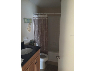 Under contract-accepting backup offers. LOWEST PRICED SFR on Key Royale Club in Florida - for sale on GolfHomes.com, golf home, golf lot