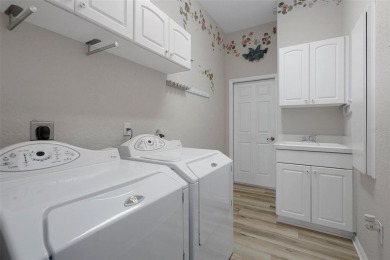 Discover the perfect blend of comfort, elegance, and on Southern Woods Golf Club in Florida - for sale on GolfHomes.com, golf home, golf lot