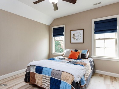 Main Floor Primary & In-Law Suite: Nestled beautifully among the on Heritage Golf Club in North Carolina - for sale on GolfHomes.com, golf home, golf lot