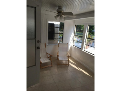 Under contract-accepting backup offers. LOWEST PRICED SFR on Key Royale Club in Florida - for sale on GolfHomes.com, golf home, golf lot