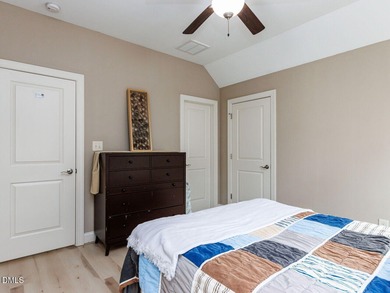 Main Floor Primary & In-Law Suite: Nestled beautifully among the on Heritage Golf Club in North Carolina - for sale on GolfHomes.com, golf home, golf lot