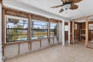 Under contract-accepting backup offers. LOWEST PRICED SFR on Key Royale Club in Florida - for sale on GolfHomes.com, golf home, golf lot
