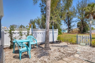 Under contract-accepting backup offers. LOWEST PRICED SFR on Key Royale Club in Florida - for sale on GolfHomes.com, golf home, golf lot