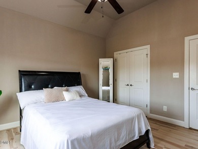 Main Floor Primary & In-Law Suite: Nestled beautifully among the on Heritage Golf Club in North Carolina - for sale on GolfHomes.com, golf home, golf lot