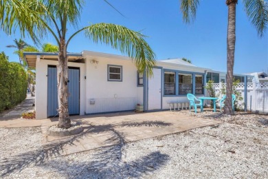 Under contract-accepting backup offers. LOWEST PRICED SFR on Key Royale Club in Florida - for sale on GolfHomes.com, golf home, golf lot