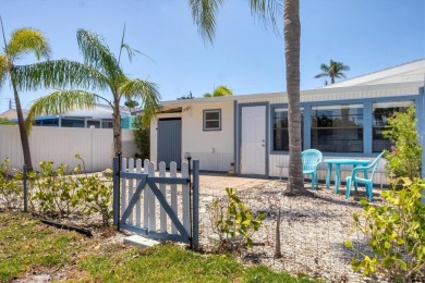 Under contract-accepting backup offers. LOWEST PRICED SFR on Key Royale Club in Florida - for sale on GolfHomes.com, golf home, golf lot