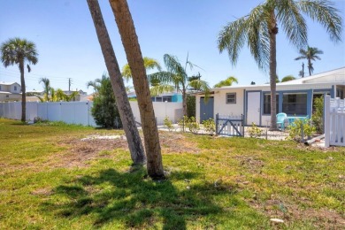 Under contract-accepting backup offers. LOWEST PRICED SFR on Key Royale Club in Florida - for sale on GolfHomes.com, golf home, golf lot