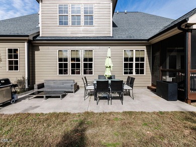 Main Floor Primary & In-Law Suite: Nestled beautifully among the on Heritage Golf Club in North Carolina - for sale on GolfHomes.com, golf home, golf lot