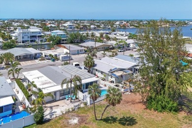 Under contract-accepting backup offers. LOWEST PRICED SFR on Key Royale Club in Florida - for sale on GolfHomes.com, golf home, golf lot
