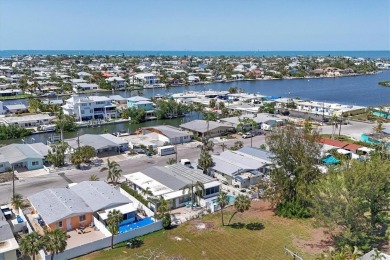 Under contract-accepting backup offers. LOWEST PRICED SFR on Key Royale Club in Florida - for sale on GolfHomes.com, golf home, golf lot