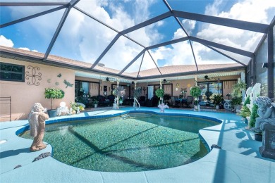 Experience the ultimate Florida lifestyle in this stunning home on Rotonda Golf and Country Club The Palms Course in Florida - for sale on GolfHomes.com, golf home, golf lot