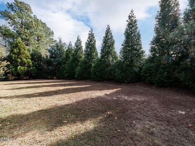 Main Floor Primary & In-Law Suite: Nestled beautifully among the on Heritage Golf Club in North Carolina - for sale on GolfHomes.com, golf home, golf lot