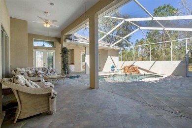 Discover the perfect blend of comfort, elegance, and on Southern Woods Golf Club in Florida - for sale on GolfHomes.com, golf home, golf lot