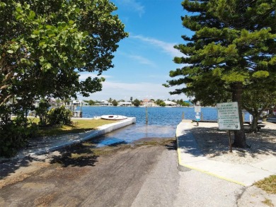 Under contract-accepting backup offers. LOWEST PRICED SFR on Key Royale Club in Florida - for sale on GolfHomes.com, golf home, golf lot
