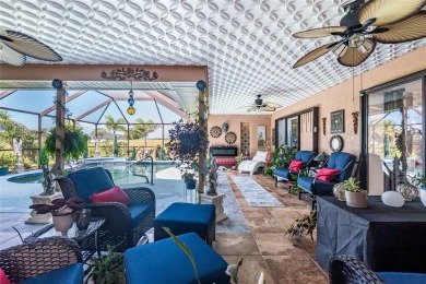Experience the ultimate Florida lifestyle in this stunning home on Rotonda Golf and Country Club The Palms Course in Florida - for sale on GolfHomes.com, golf home, golf lot