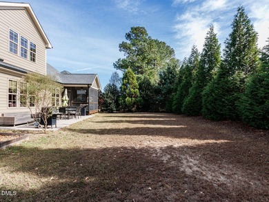 Main Floor Primary & In-Law Suite: Nestled beautifully among the on Heritage Golf Club in North Carolina - for sale on GolfHomes.com, golf home, golf lot