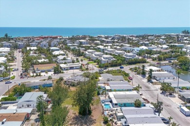 Under contract-accepting backup offers. LOWEST PRICED SFR on Key Royale Club in Florida - for sale on GolfHomes.com, golf home, golf lot
