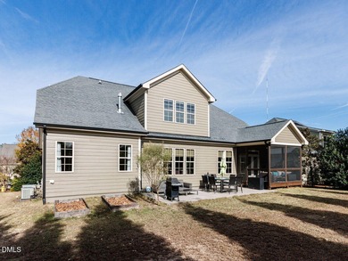 Main Floor Primary & In-Law Suite: Nestled beautifully among the on Heritage Golf Club in North Carolina - for sale on GolfHomes.com, golf home, golf lot