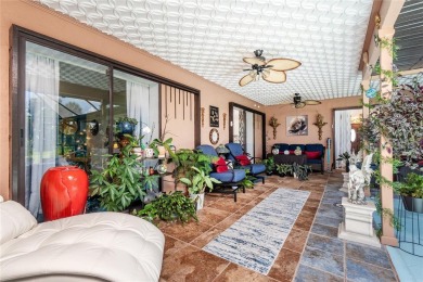 Experience the ultimate Florida lifestyle in this stunning home on Rotonda Golf and Country Club The Palms Course in Florida - for sale on GolfHomes.com, golf home, golf lot