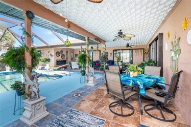 Experience the ultimate Florida lifestyle in this stunning home on Rotonda Golf and Country Club The Palms Course in Florida - for sale on GolfHomes.com, golf home, golf lot