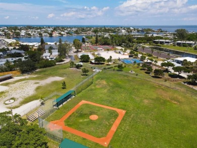 Under contract-accepting backup offers. LOWEST PRICED SFR on Key Royale Club in Florida - for sale on GolfHomes.com, golf home, golf lot