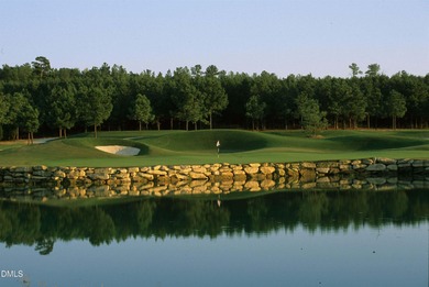 Main Floor Primary & In-Law Suite: Nestled beautifully among the on Heritage Golf Club in North Carolina - for sale on GolfHomes.com, golf home, golf lot