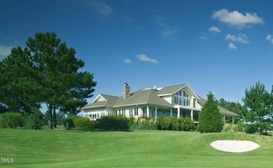 Main Floor Primary & In-Law Suite: Nestled beautifully among the on Heritage Golf Club in North Carolina - for sale on GolfHomes.com, golf home, golf lot