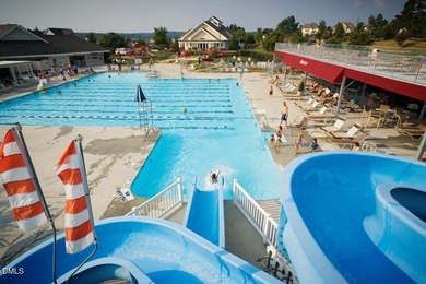 Main Floor Primary & In-Law Suite: Nestled beautifully among the on Heritage Golf Club in North Carolina - for sale on GolfHomes.com, golf home, golf lot