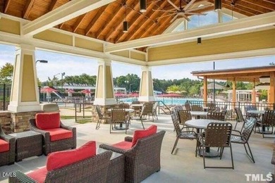 Main Floor Primary & In-Law Suite: Nestled beautifully among the on Heritage Golf Club in North Carolina - for sale on GolfHomes.com, golf home, golf lot