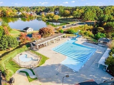 Main Floor Primary & In-Law Suite: Nestled beautifully among the on Heritage Golf Club in North Carolina - for sale on GolfHomes.com, golf home, golf lot