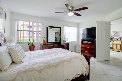 Welcome to this beautifully maintained first-floor corner unit on Sunrise Lakes Phase IV Golf Course in Florida - for sale on GolfHomes.com, golf home, golf lot